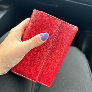 Wallet genuine leather red color with 10 card holders w/ zipper compartment.